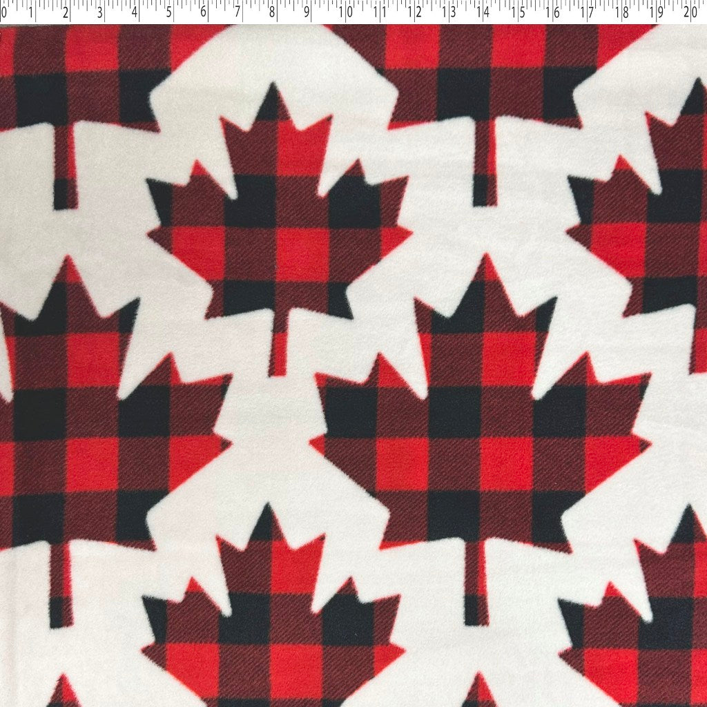 ivory medium weight polyester fleece with large bright red and black buffalo print maple leaf.
