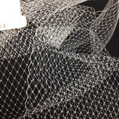white nylon hat netting scalloped on both edges 9 inches wide