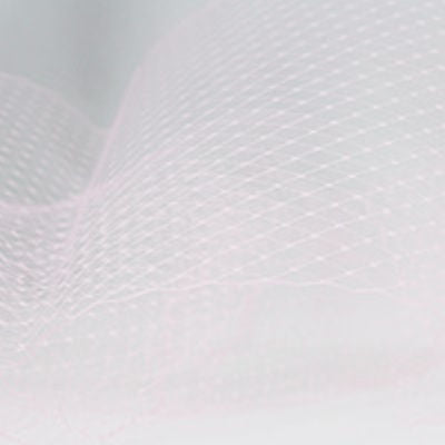pink nylon hat netting scalloped on both edges 9 inches wide