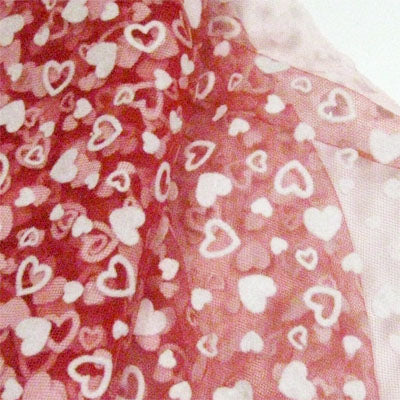 red polyester tulle with white flocked heart