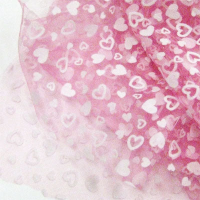 pink polyester tulle with white flocked heart
