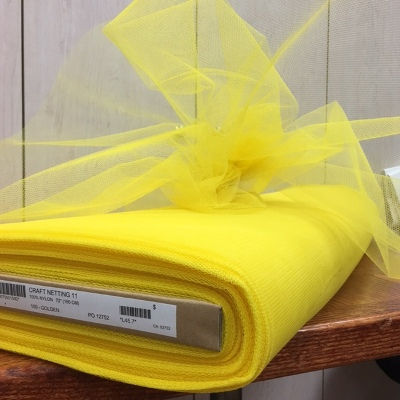 golden nylon netting with a crisp hand