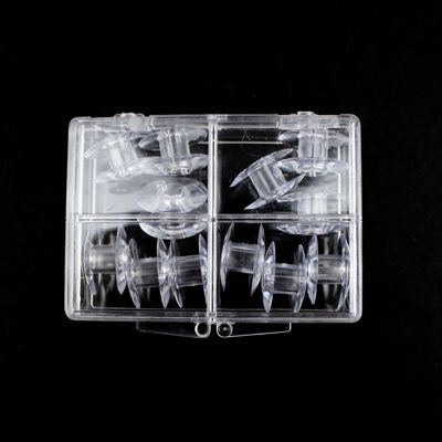 12 REUSABLE PLASTIC BOBBINS IN PLASTIC CASE