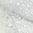 white polyester tulle with flocked heart