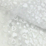 white polyester tulle with flocked heart