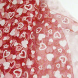 red polyester tulle  with white flocked heart 