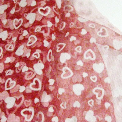 red polyester tulle  with white flocked heart 