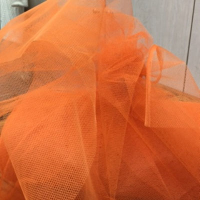 orange nylon netting with a crisp hand
