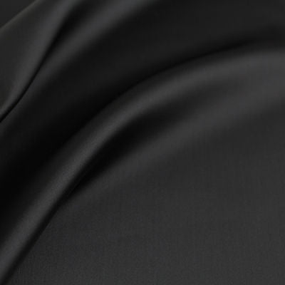 medium weight polyester spandex satin in the colour of black