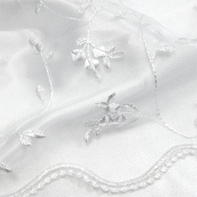white rose bud embroidered mesh with scapolled edge
