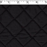 black polyester cotton face and back quilted broadcloth with 4 oz polyester fill