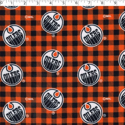 medium weight brushed NHL cotton in the print of Edmonton Oilers on a orange and blue buffalo check background