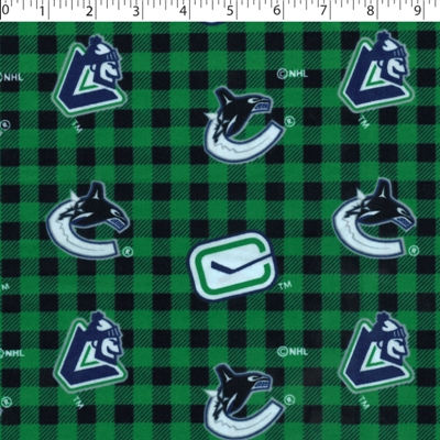 medium weight brushed NHL cotton in the print of Vancouver Canusk  on a green and black buffalo check background