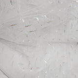 white shimmering feathers tulle