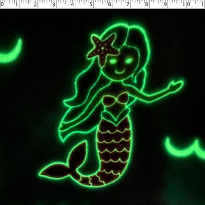 mermaids glowing in the dark