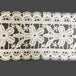 white 41mm of floral lace with scalloped edges 